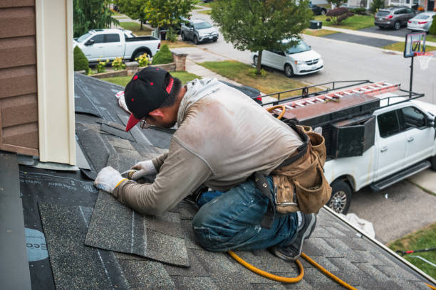 Professional Roofing technician working in Wakefield, MI